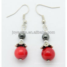 Vente en gros de corail rouge avec boucles d&#39;oreilles rondes hematites